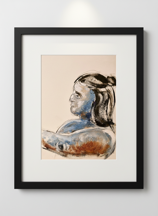 Framed artwork portrait of a woman in profile on a plain wall
