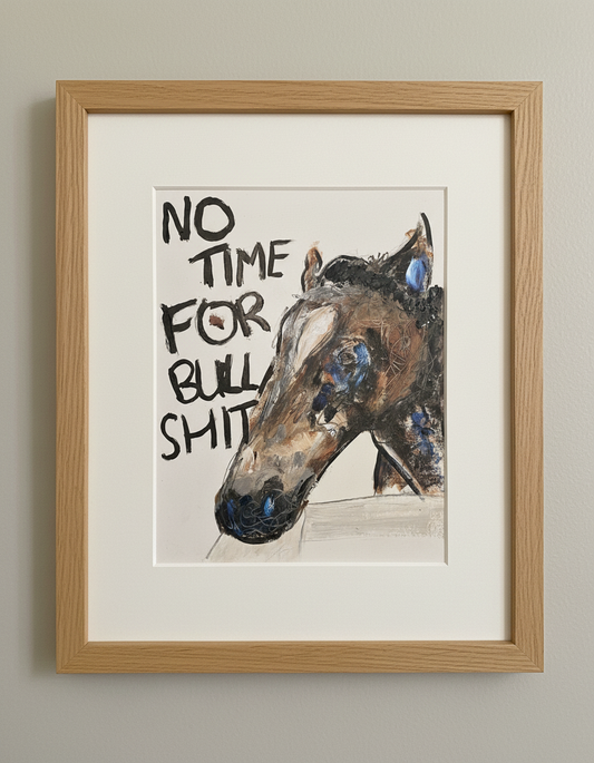 Framed artwork with a horse's head and text 'No Time For Bullshit' on a beige background